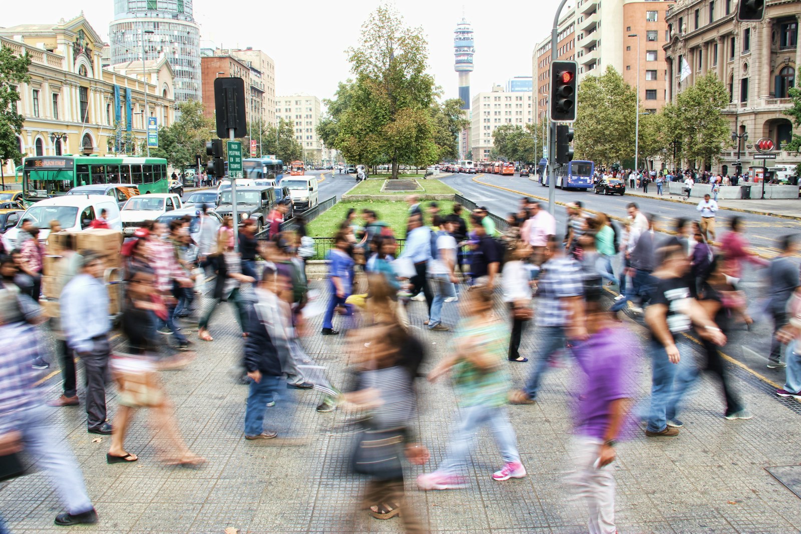 Crowd of people blurred in motion on a city street