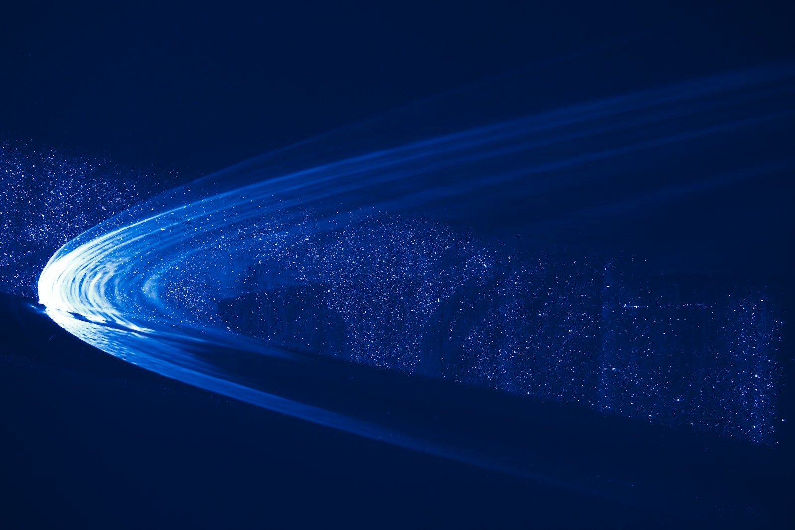 Fiber optic strands and light trails, like an encrypted data tunnel