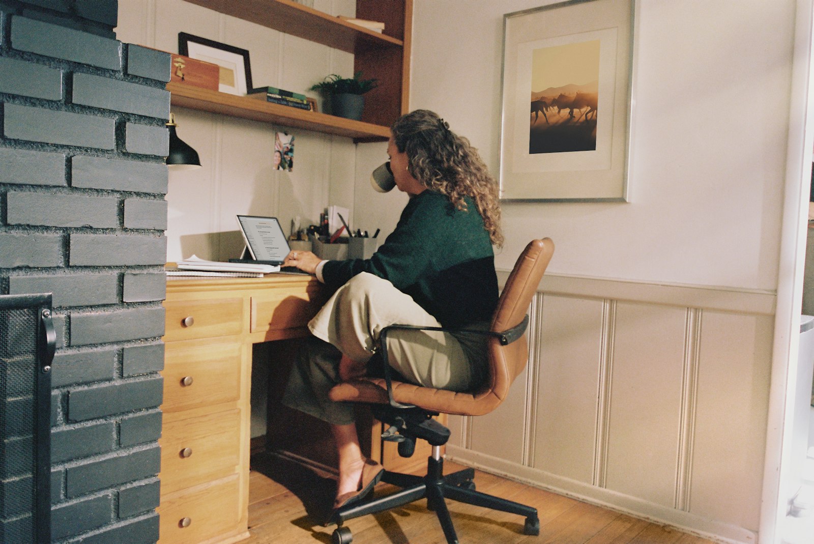 Working at a desktop computer at home